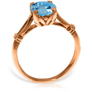 14K. SOLID GOLD SOLITAIRE RING WITH BLUE TOPAZ (Rose Gold)